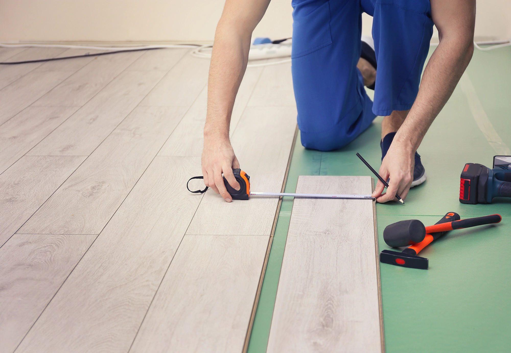 Handymen Installing Floor In St Albans
